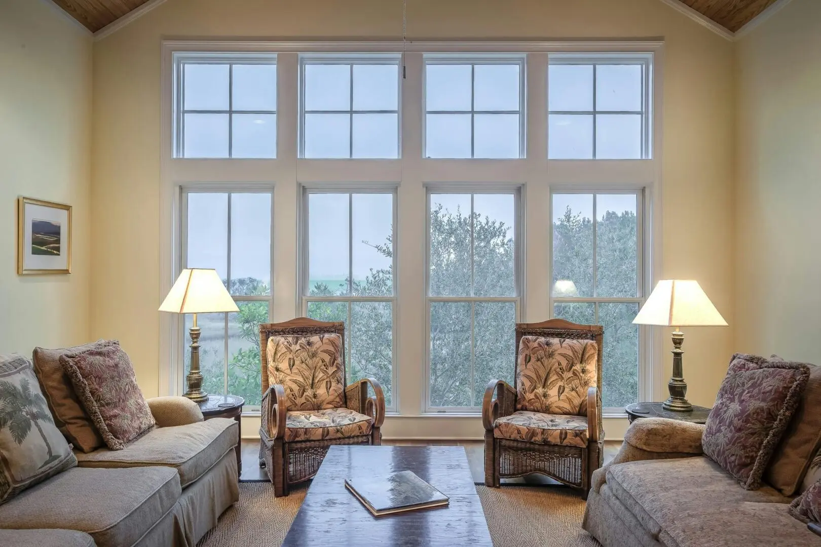 A living room with two chairs and a coffee table